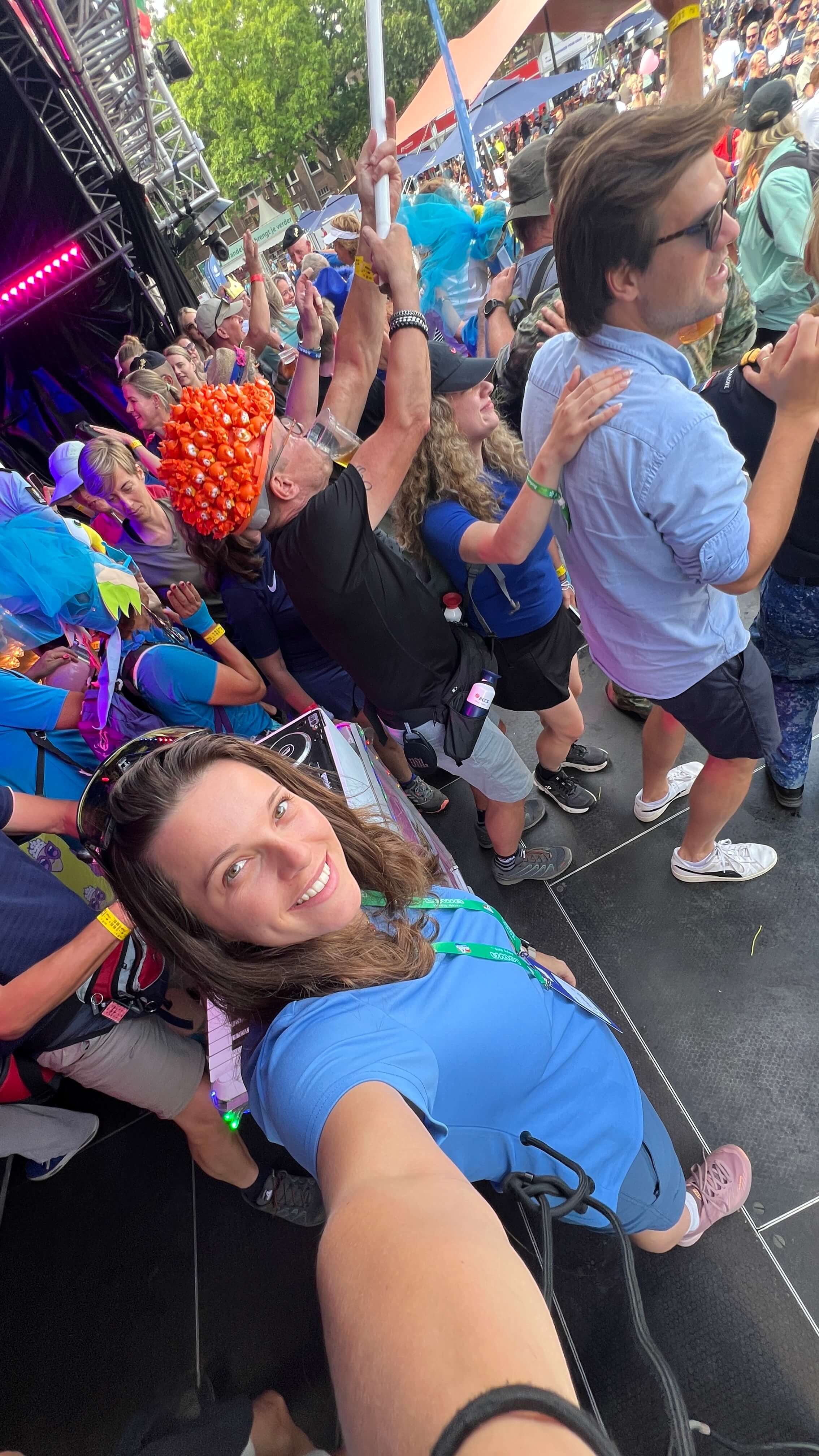 crowd, festival, stage, orange hat, lanyard