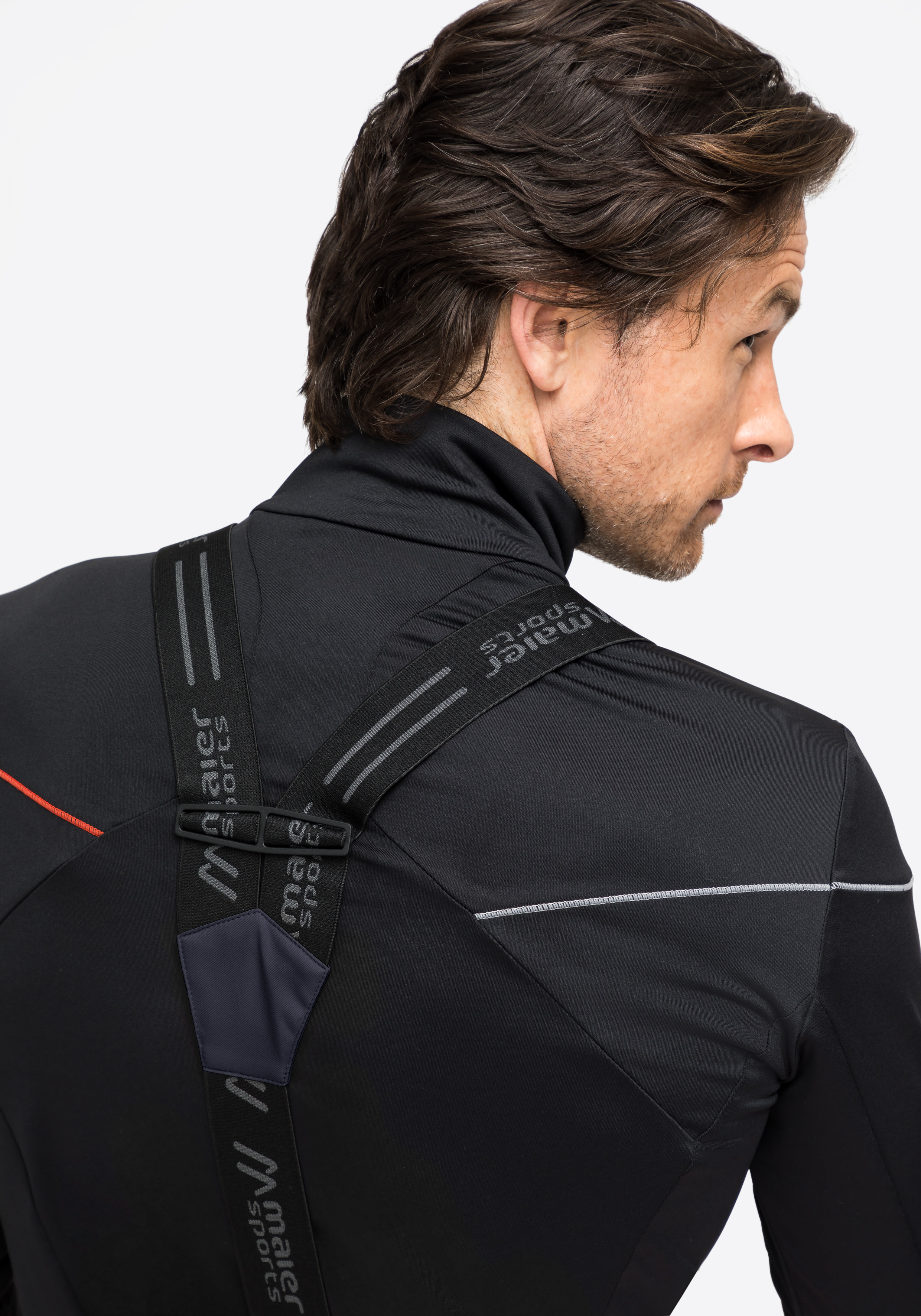 Mantel, Langarm, Erwachsener, Mann, Person, Schulterriemen, Rückengurt, Sportjacke, schwarze Jacke, reflektierender Streifen